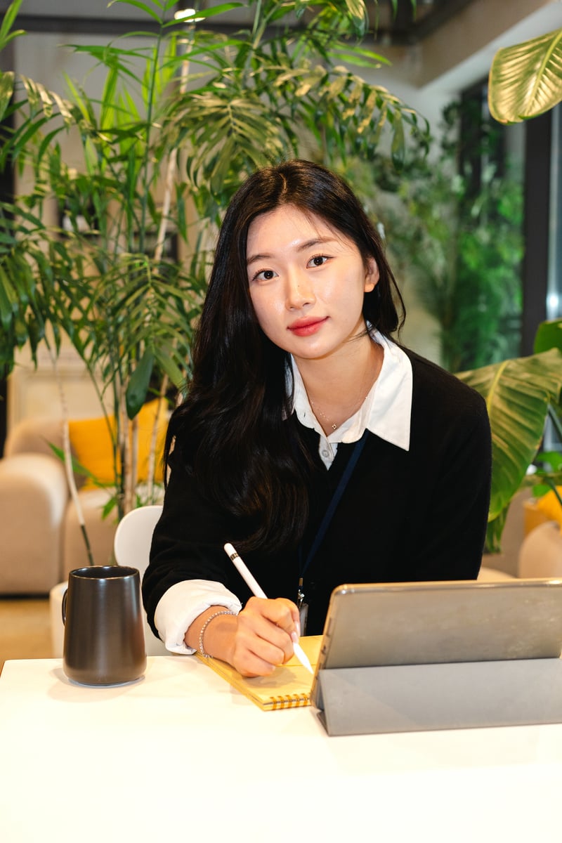 Female Office Worker Using a Tablet